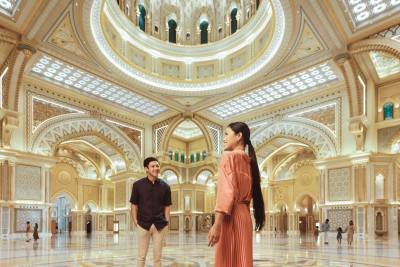touists enjoying views of louvre museum and presidential palace on Abu Dhabi City Tour From Four Points By Sheraton Sheikh Zayed Road Dubai