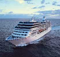 cruise ship passengers enoying shore excursions in dubai, like dubai city tour, desert safari in dubai, at the top burj khalifa on dubai shore excursions for Oceania Insignia