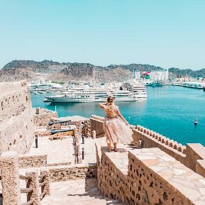 a beauting view of muttrah corniche muttrah souk aamuttrah fort on a oman day tour from dubai