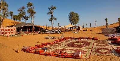 tourists enjoying the evening, overnight, morning, afternoon, desert safari on desert safari dubai tour