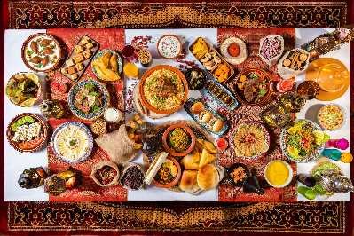 mouth watering bbq dishes with buffet, are served to guests in our bedouin camp on a ras al khaimah desert safari dinner